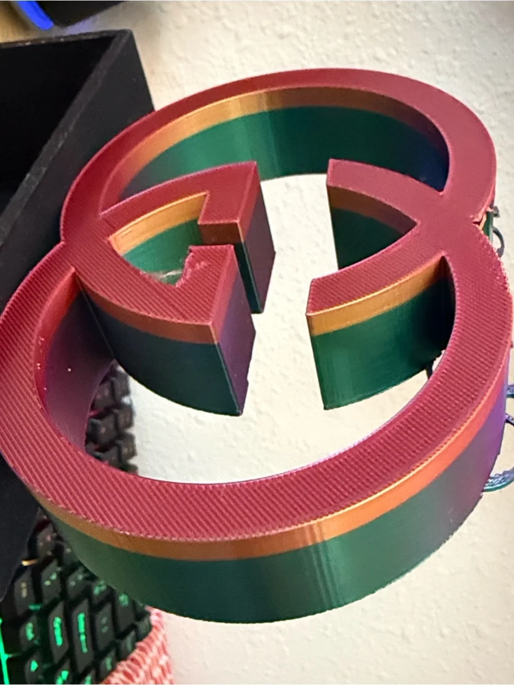 Gucci home accent iridescent color, changing purple, green gold